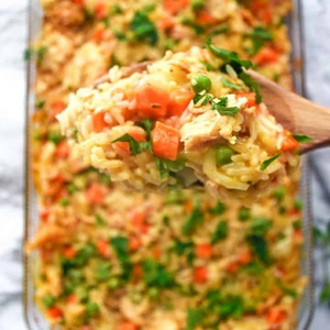 Creamy Chicken and Rice with peas, carrots and cheddar